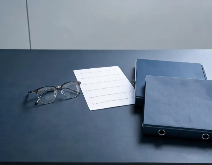 Independent prescription sunglasses sourcing desk reviewing millimetre notes